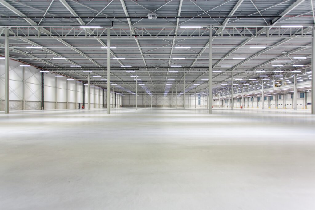 the,interior,of,a,new,empty,lighted,warehouse,ready,to